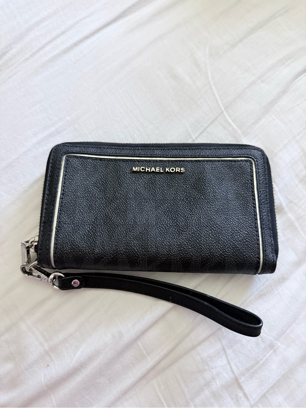 Michael Kors Black Wristlet with Cream Piping and Silver Hardware